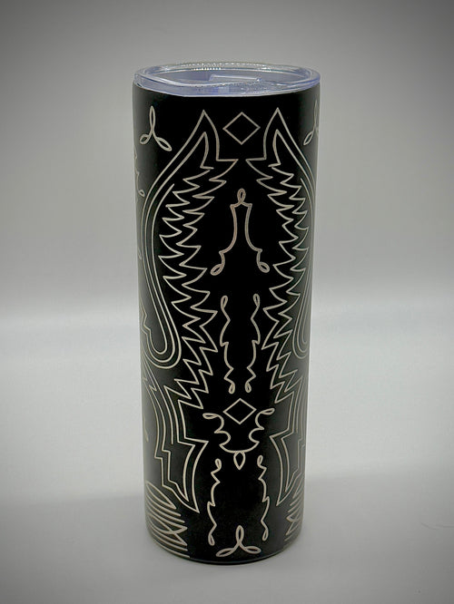 Black cylindrical container with white abstract patterns on a gray background
