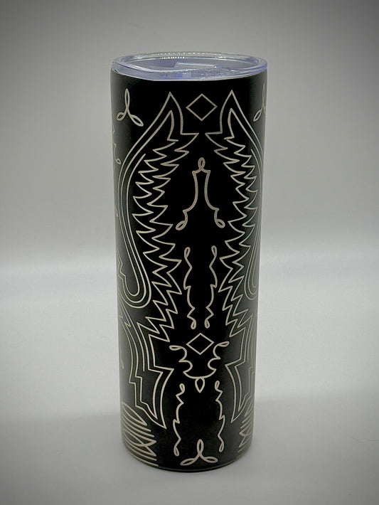 Black cylindrical container with white abstract patterns on a gray background